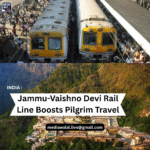 "Train traveling through mountainous terrain on Jammu to Vaishno Devi Katra route, symbolizing enhanced pilgrim connectivity."