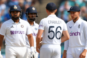 Four cricket players during the India vs England 2025 Test match, with Indian and English players facing each other on the field.